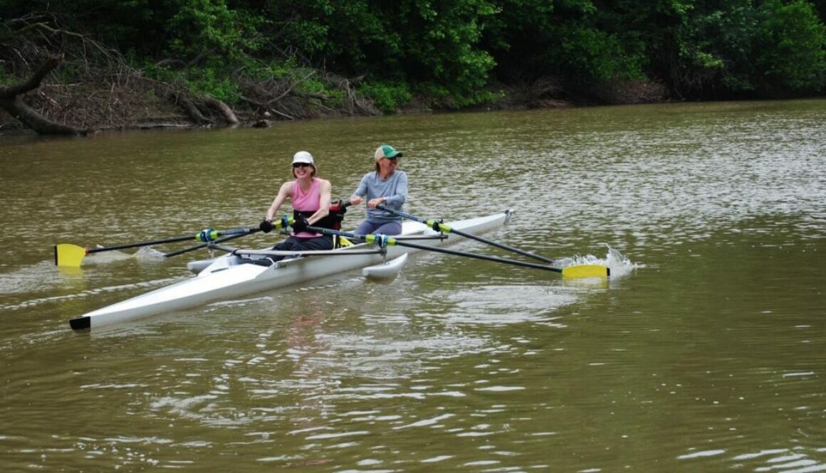Jenny with a spinal cord injury rowing a kayak